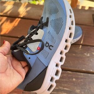 On Cloudstrstus Sneakers in Marina Blue and Magnet Grey